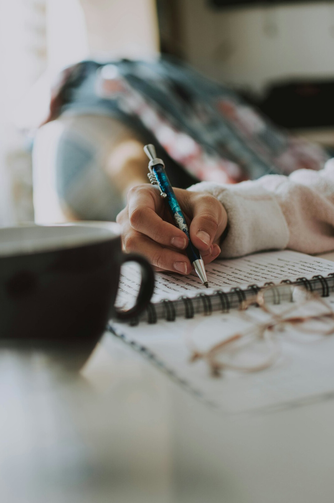person writing goals